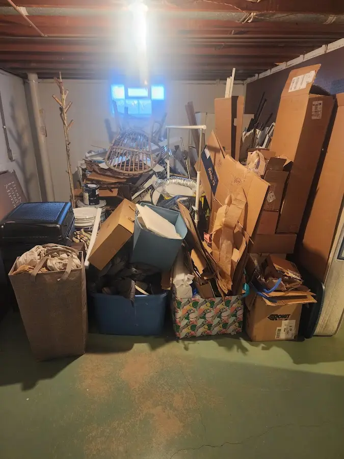 Roll-off dumpster container at job site for Concrete Dumpster Rental in Kalkaska